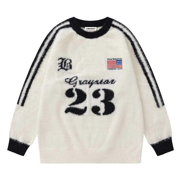 white fuzzy sweater with number 23