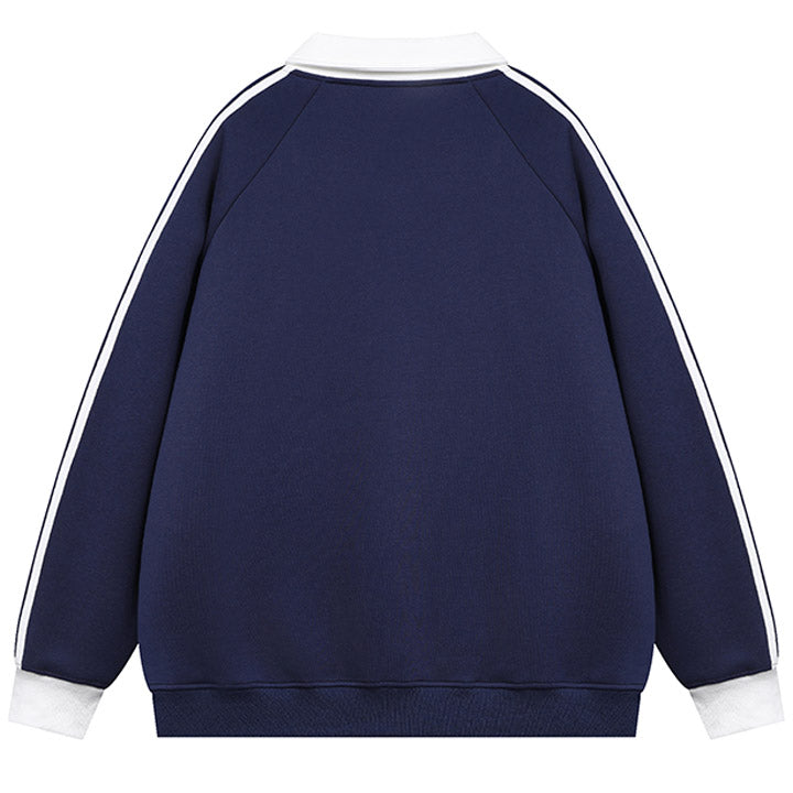 blue and white pullover with letter